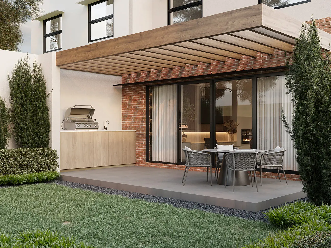Residential alfresco visualisation for 25 Deakin Street, Bentleigh East, presenting a sheltered outdoor dining terrace, built-in barbecue kitchen, timber pergola, brick detailing and landscaped backyard. Photorealistic 3D render of a covered backyard alfresco at 25 Deakin Street, Bentleigh East, with an outdoor kitchen, dining setting, timber pergola and landscaped lawn