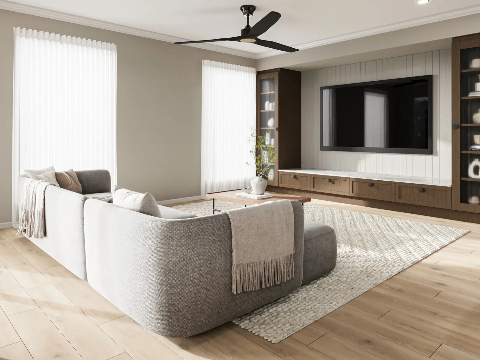 Residential living-room visualisation for Eastridge in Coolum Beach, presenting custom dark-timber entertainment joinery, a relaxed neutral lounge setting, timber flooring and soft coastal daylight. Photorealistic residential 3D render of the Eastridge living room in Coolum Beach with warm timber joinery, soft neutral furniture and abundant natural light