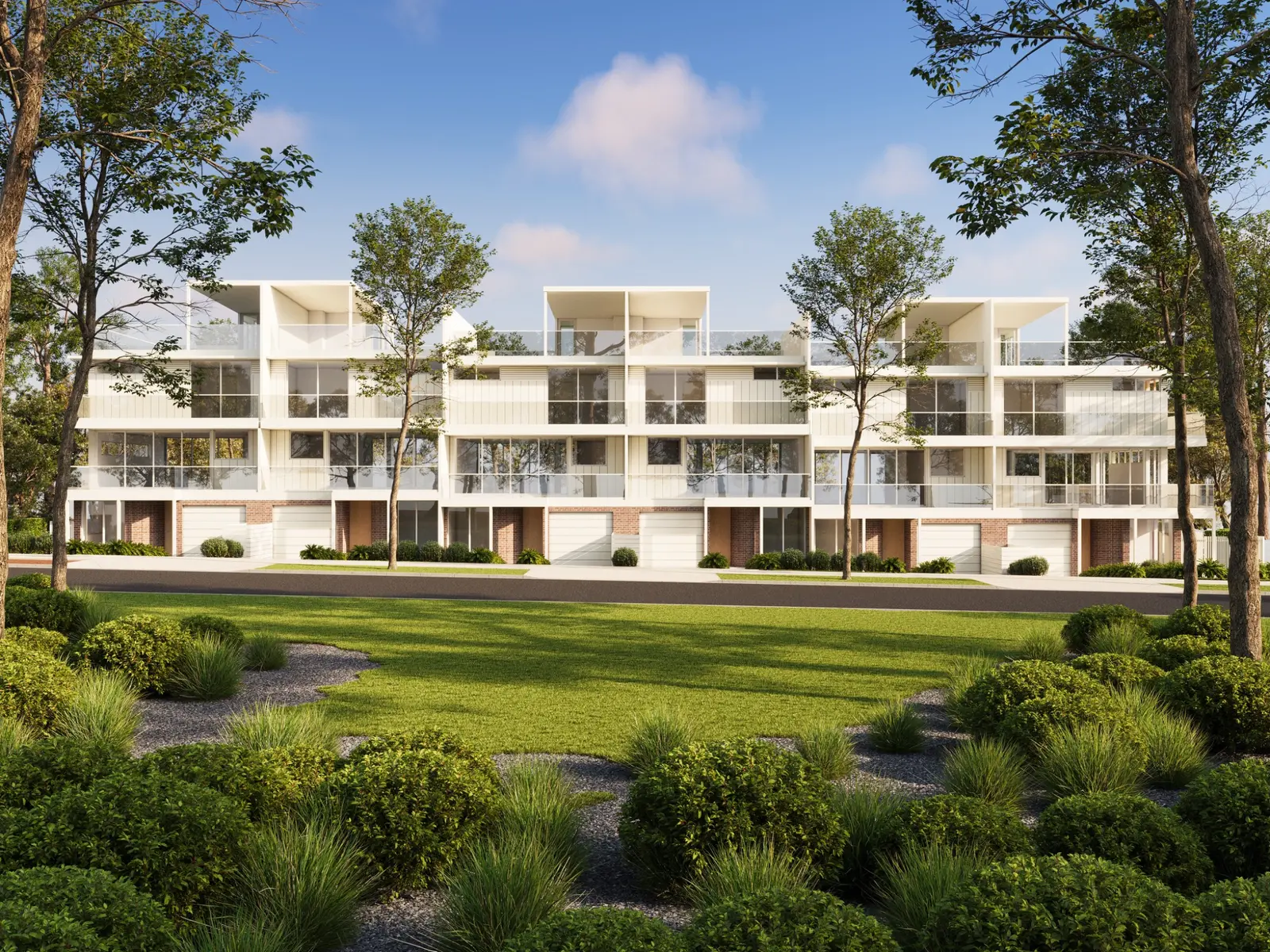 Residential development visualisation for 19 Jubilee Avenue, Ulladulla, showing a coordinated row of contemporary multi-level townhouses with rooftop terraces, balconies, integrated garages and generous landscape. Photorealistic residential 3D render of contemporary three-storey townhouses at 19 Jubilee Avenue, Ulladulla, viewed across landscaped parkland