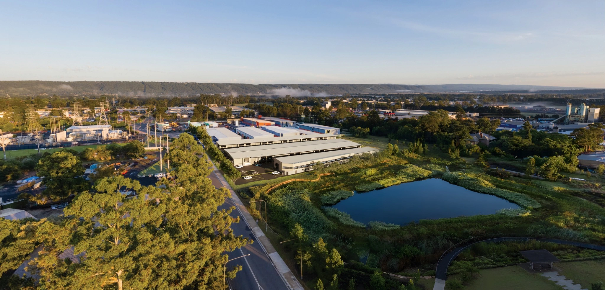 Aerial 3D site visualisation of a large Australian development with buildings, roads and landscape