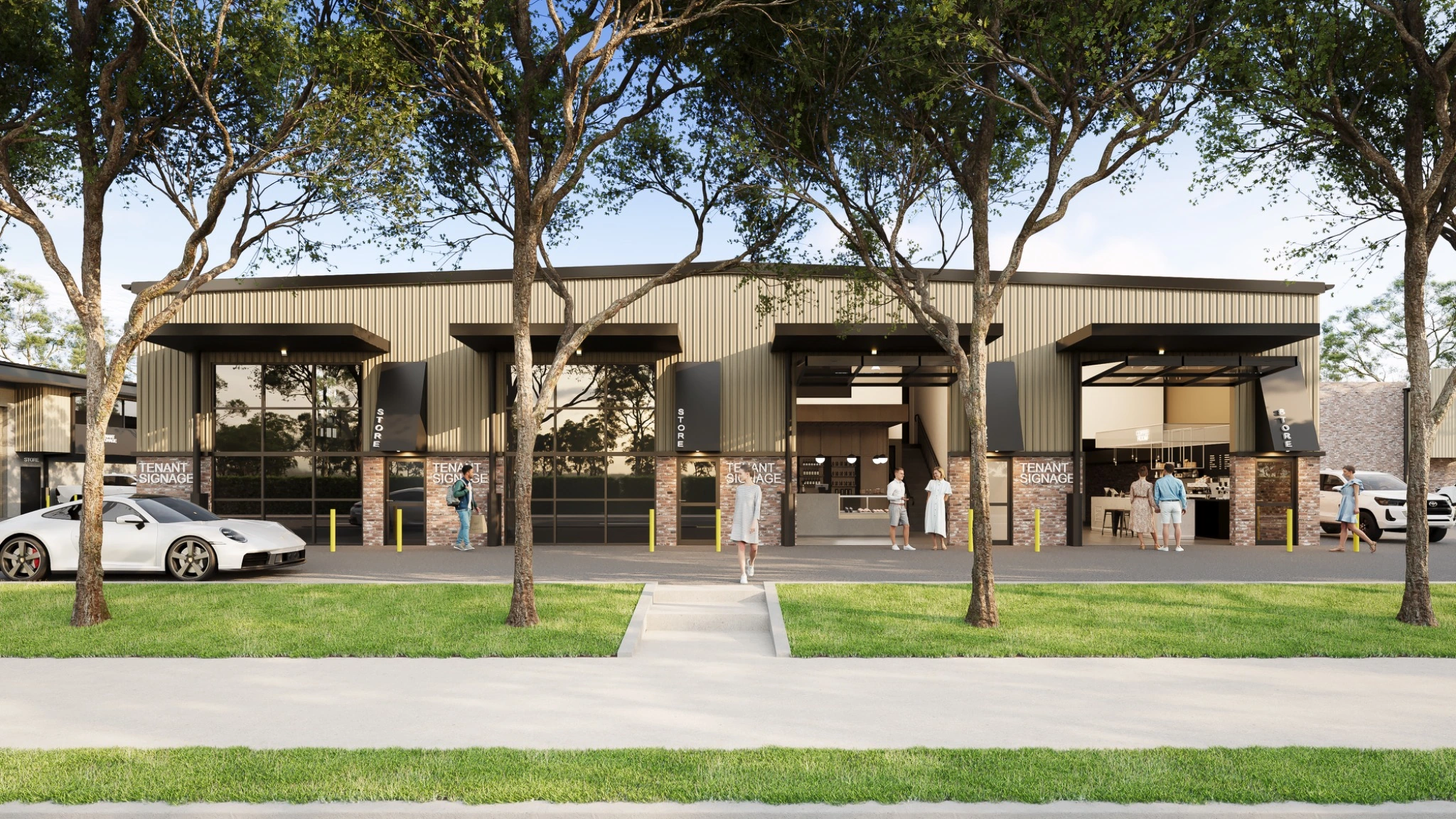 High-resolution commercial architectural visualisation of a Penrith industrial development, presenting modern warehouse units, brick and metal cladding, customer entries, vehicles and landscaping. Commercial exterior 3D render of contemporary industrial units with glazed frontages, loading access, tenant signage and landscaped street presentation in Penrith