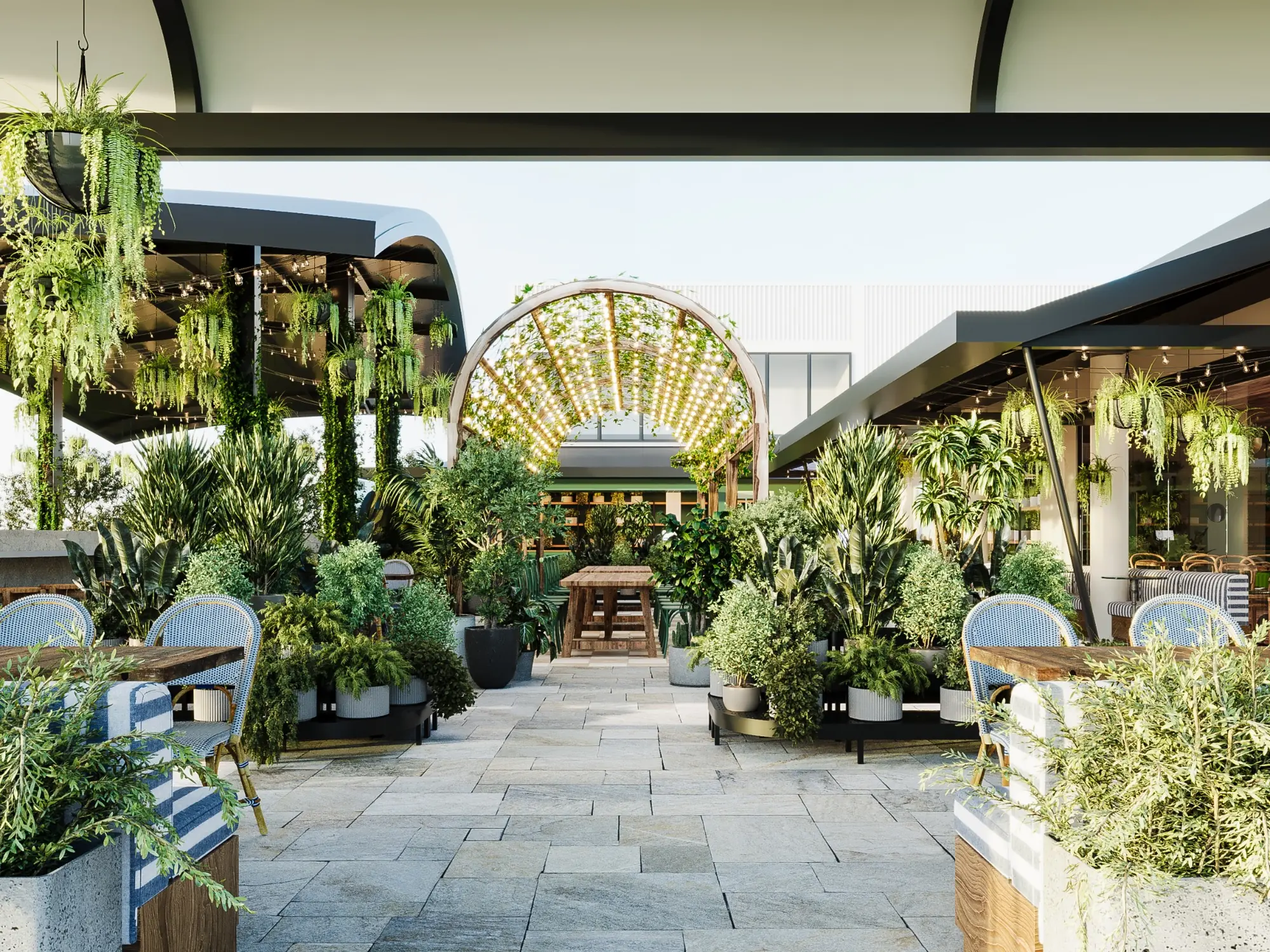 Hospitality and public-realm visualisation for Prahran Market, showing a lush landscaped courtyard with outdoor dining terraces, layered planting and a central illuminated garden arbour. Photorealistic 3D render of the landscaped hospitality courtyard at Prahran Market with abundant planting, outdoor dining, striped seating and a feature illuminated arbour